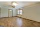 Living room with hardwood floors, an exterior door, and natural light from the window at 6950 Shannon Dr, Lithia Springs, GA 30122