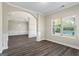 Open living area with archway and wood floors at 634 Gardner Rd, Stockbridge, GA 30281