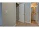 Walk-in closet with white shelves and carpeted floor at 20 Highgate Trl, Covington, GA 30016