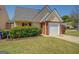 Charming single Gathering home with a one car garage and a well maintained lawn at 20 Highgate Trl, Covington, GA 30016