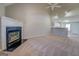Spacious living room with fireplace and stairs at 20 Highgate Trl, Covington, GA 30016