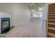 Spacious living room with fireplace and stairs at 20 Highgate Trl, Covington, GA 30016