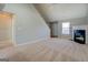 Spacious living room with fireplace and stairs at 20 Highgate Trl, Covington, GA 30016