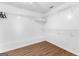 Walk-in closet features wood floors and multiple levels of wire shelving for optimal storage at 202 Willow Rock Pt, Fayetteville, GA 30215