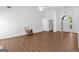 Spacious living room boasts hardwood flooring, high ceilings, and abundant natural light, creating a serene atmosphere at 202 Willow Rock Pt, Fayetteville, GA 30215