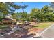 Community playground and picnic shelter surrounded by lush greenery, providing a recreational space at 202 Willow Rock Pt, Fayetteville, GA 30215