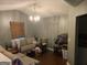 Comfortable living room featuring a chandelier and neutral decor at 4379 Cross Ln, Decatur, GA 30035