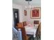 Comfortable dining room features a chandelier and table for six at 1055 Field View Dr, Mcdonough, GA 30253