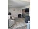 The living room features updated lighting, light walls and modern decor at 1055 Field View Dr, Mcdonough, GA 30253