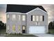 Charming two-story brick home with attached two car garage and black shutters at 223 Ferndale Dr # 114, Fairburn, GA 30213
