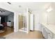 Ensuite bathroom featuring walk-in shower and double vanity at 340 Hammersmith Dr, Suwanee, GA 30024