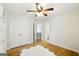 Bright bedroom with hardwood floors and ample closet space at 340 Hammersmith Dr, Suwanee, GA 30024