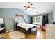 Vaulted Primary bedroom featuring hardwood floors, a ceiling fan, and bright natural light at 340 Hammersmith Dr, Suwanee, GA 30024