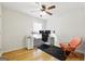 Bright office space with wood floors, ceiling fan, and natural light at 340 Hammersmith Dr, Suwanee, GA 30024