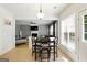 Bright dining room with views into the living room and backyard at 340 Hammersmith Dr, Suwanee, GA 30024