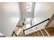 Bright entryway featuring hardwood floors, a modern chandelier, and an inviting open door at 340 Hammersmith Dr, Suwanee, GA 30024