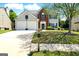 Charming two-story home with a brick facade, two-car garage, and well-manicured front lawn at 340 Hammersmith Dr, Suwanee, GA 30024