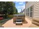 Inviting hot tub situated on a private backyard patio at 340 Hammersmith Dr, Suwanee, GA 30024