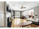 A living room with hardwood floors and view to the kitchen at 340 Hammersmith Dr, Suwanee, GA 30024