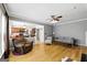 Cozy living room showcasing an open layout, hardwood floors, and ample natural light at 340 Hammersmith Dr, Suwanee, GA 30024