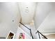High angle of open staircase with modern lighting at 340 Hammersmith Dr, Suwanee, GA 30024