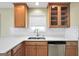 Close-up on the updated kitchen with stainless steel appliances, white countertops, and light wood cabinetry at 1313 Jubilee Ln, Mcdonough, GA 30253