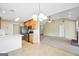 Open kitchen with modern appliances, white countertops, light cabinets, and view to living area at 1313 Jubilee Ln, Mcdonough, GA 30253