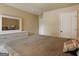 Bedroom featuring neutral tones, a dresser with mirror, and lots of natural light at 3541 Stoneleigh Walk, Lithonia, GA 30038