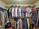 Walk-in closet with lots of hanging space for clothes and accessories at 3541 Stoneleigh Walk, Lithonia, GA 30038