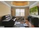 Comfortable living room featuring recessed ceilings, a leather sofa, and a wall mounted TV at 3541 Stoneleigh Walk, Lithonia, GA 30038