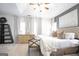 Bright bedroom featuring a tray ceiling, neutral decor, and large windows for ample natural light at 3417 Double Eagle Dr # Bldg 31, Marietta, GA 30008