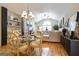 Elegant dining area with chandelier, seating for six, and views of the living room at 3417 Double Eagle Dr # Bldg 31, Marietta, GA 30008