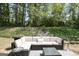 Inviting patio with wicker seating offers a tranquil outdoor space surrounded by lush greenery at 3417 Double Eagle Dr # Bldg 31, Marietta, GA 30008