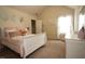 Bright bedroom with vaulted ceilings, soft colors, and natural light from the window at 316 Trulove Lane Lot 35 # 35, Locust Grove, GA 30248