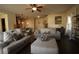 Spacious living area with plush seating, hardwood floors, and open-concept design at 316 Trulove Lane Lot 35 # 35, Locust Grove, GA 30248