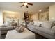 Open-concept living area with neutral decor, hardwood floors, and views of the kitchen and dining space at 316 Trulove Lane Lot 35 # 35, Locust Grove, GA 30248