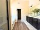 Bright bathroom showcasing double vanity, granite countertops, soaking tub and wood look flooring at 328 Trulove Lane Lot 32 # 32, Locust Grove, GA 30248