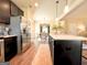 Well-lit kitchen with granite countertops and stainless steel refrigerator at 328 Trulove Lane Lot 32 # 32, Locust Grove, GA 30248