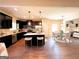 Modern kitchen with dark cabinetry, stainless steel appliances, and island seating at 328 Trulove Lane Lot 32 # 32, Locust Grove, GA 30248