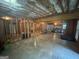 Spacious unfinished basement with exposed beams and concrete floor, ready for customization to create your dream space at 135 Danube Trl, Stockbridge, GA 30281