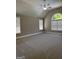 Large bedroom with vaulted ceiling, ceiling fan and multiple windows at 135 Danube Trl, Stockbridge, GA 30281
