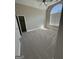 Bedroom with neutral carpet and paint, vaulted ceiling, and a large window for natural light at 135 Danube Trl, Stockbridge, GA 30281