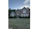 Lovely two-story brick home with manicured landscaping and inviting curb appeal at 135 Danube Trl, Stockbridge, GA 30281