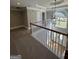 Elegant foyer featuring a chandelier, staircase, and a view to the front doors at 135 Danube Trl, Stockbridge, GA 30281