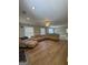 Spacious living room with hardwood floors, recessed lighting, and ample seating at 135 Danube Trl, Stockbridge, GA 30281