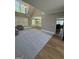 Spacious living room showcasing new carpeting, soaring ceilings, and ample natural light at 135 Danube Trl, Stockbridge, GA 30281