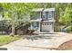 Lovely home with an attached garage, complemented by a well-manicured lawn and inviting driveway at 2998 Kenville Ln, Decatur, GA 30034