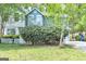 Charming two-story home featuring a well-maintained lawn and a quaint white picket fence at 2998 Kenville Ln, Decatur, GA 30034