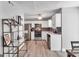 Stylish kitchen featuring stainless steel appliances, white cabinets, and modern fixtures at 2998 Kenville Ln, Decatur, GA 30034