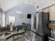 This eat-in kitchen boasts stainless steel appliances and a built-in breakfast nook at 2040 Elm Grove Ln, Hampton, GA 30228